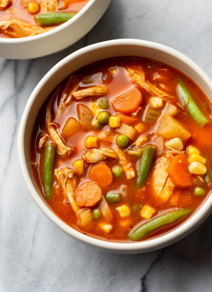 two bowls of chicken vegetable soup