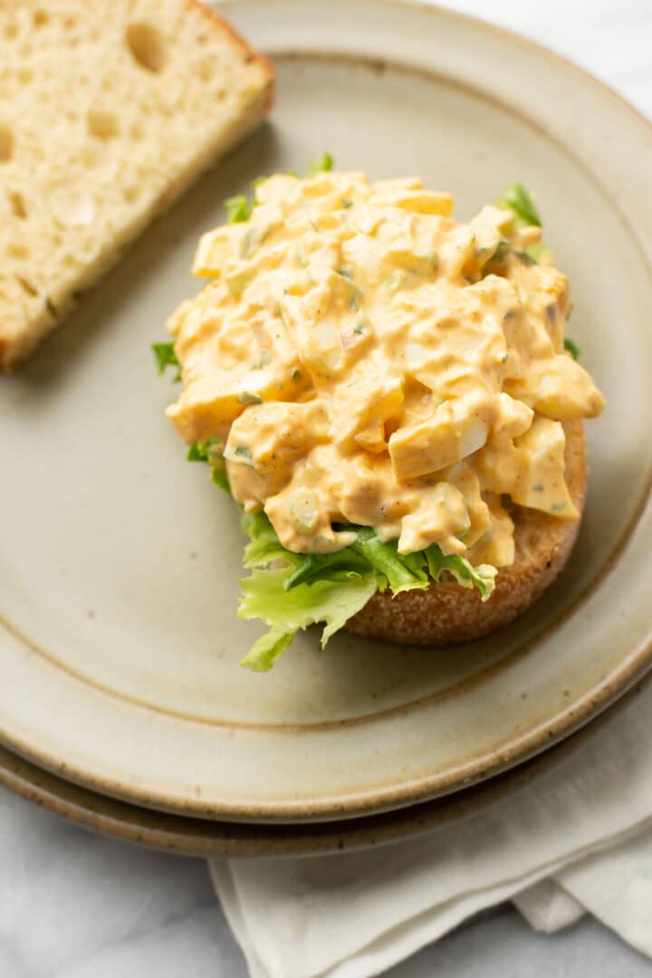 an egg salad sandwich on a plate
