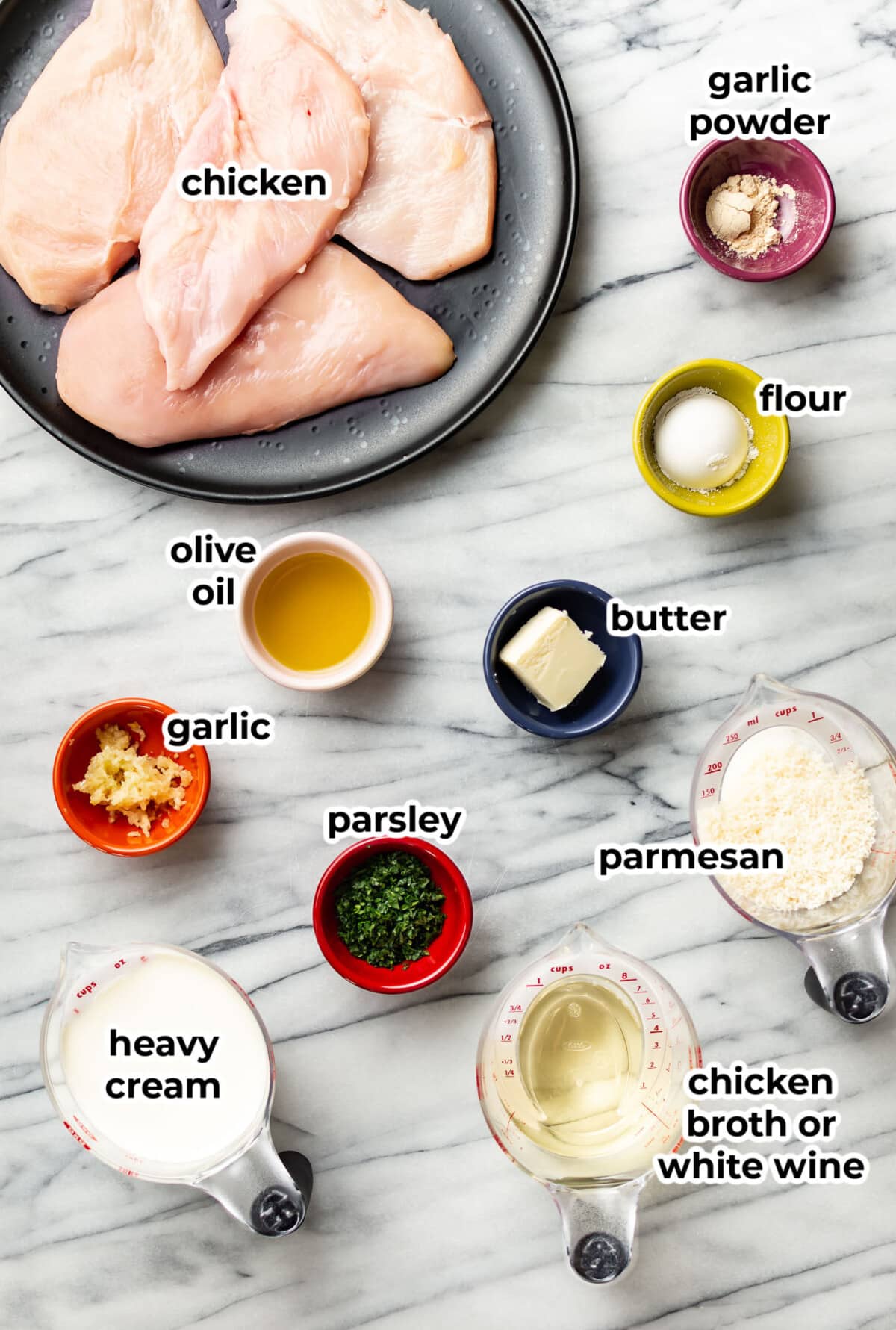 ingredients for creamy garlic parmesan chicken in prep bowls