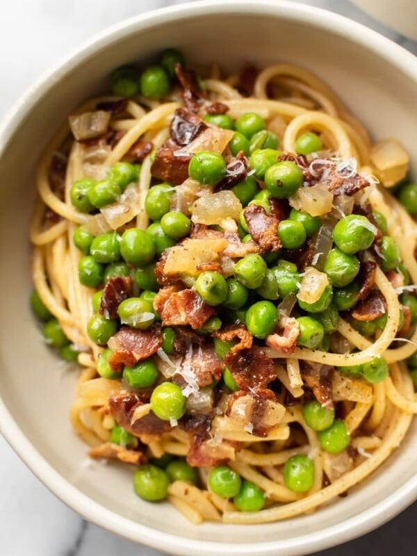 bacon and pea pasta in a bowl