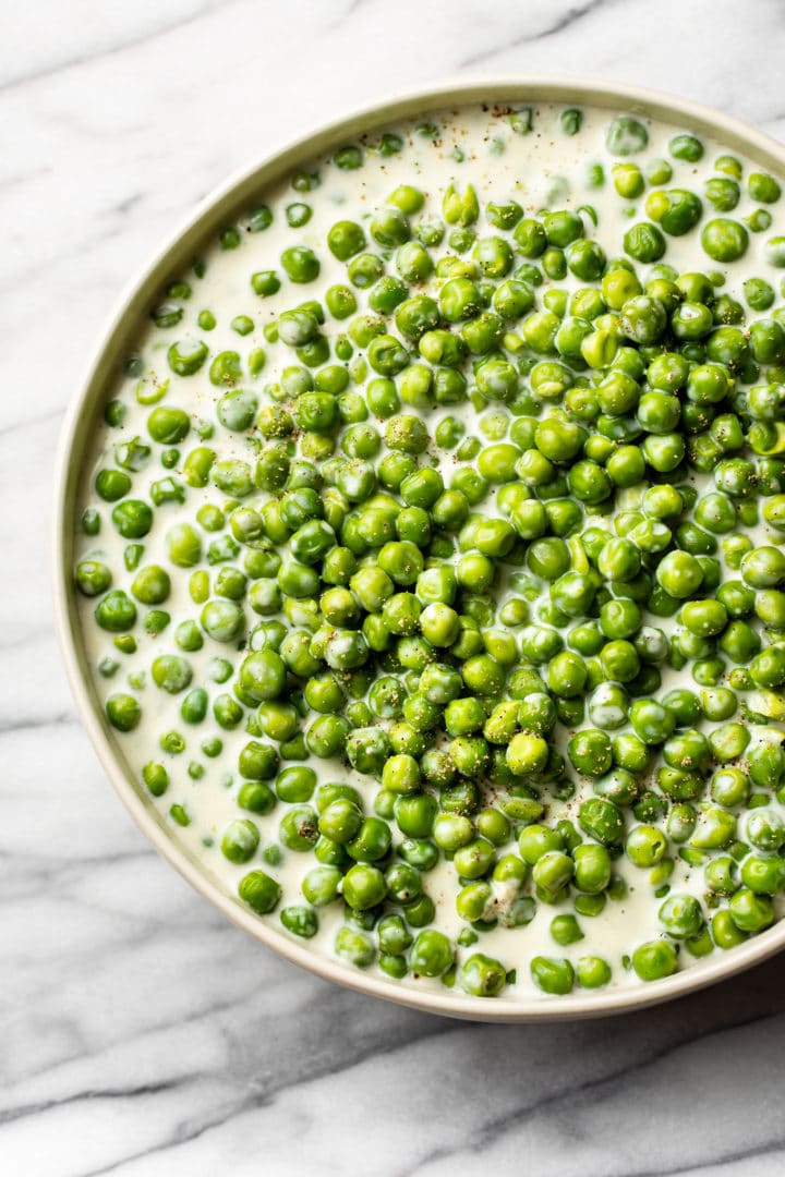 creamed peas in a serving bowl
