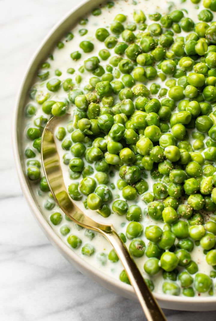 close-up of creamed peas in a serving bowl