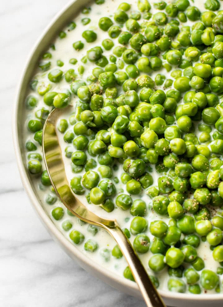 close-up of creamed peas in a serving bowl