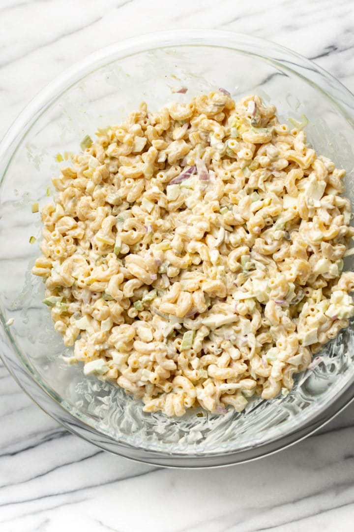 old fashioned macaroni salad in a glass prep bowl