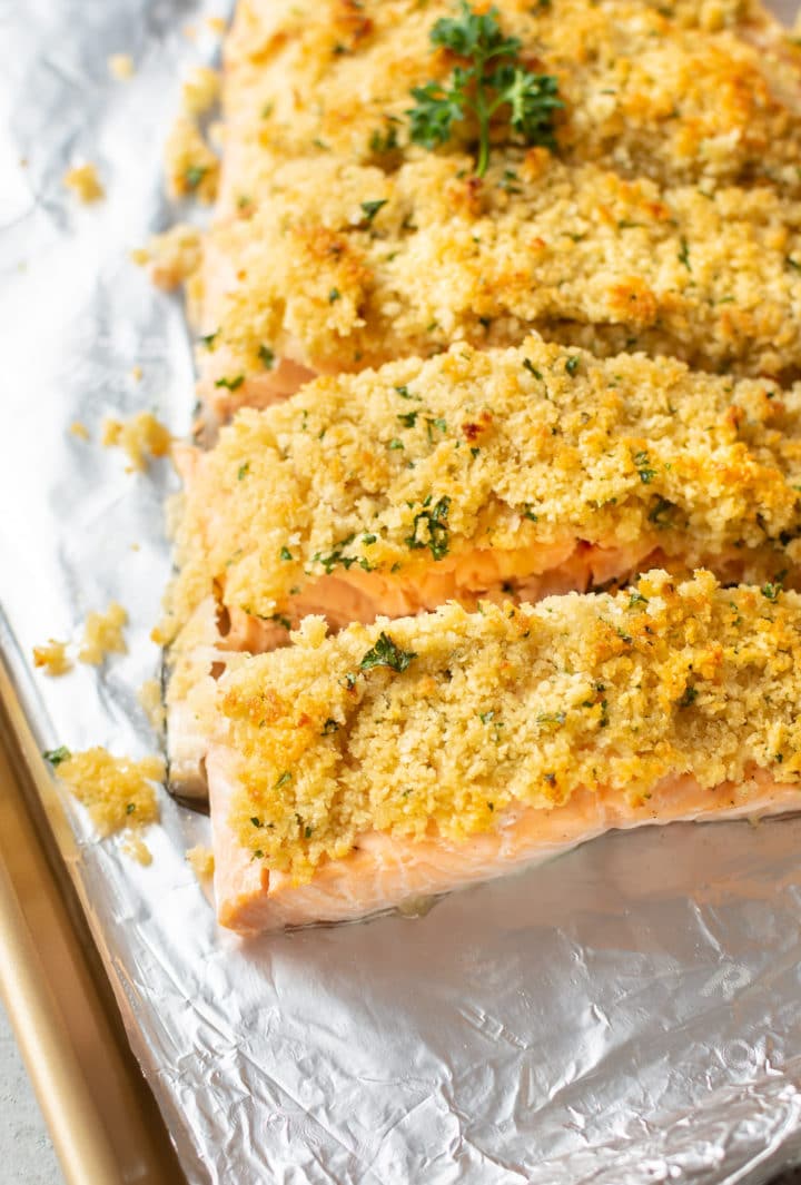 close-up of maple dijon breadcrumb baked salmon on a baking sheet