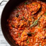 close-up of the best Chicken Cacciatore in a Dutch oven