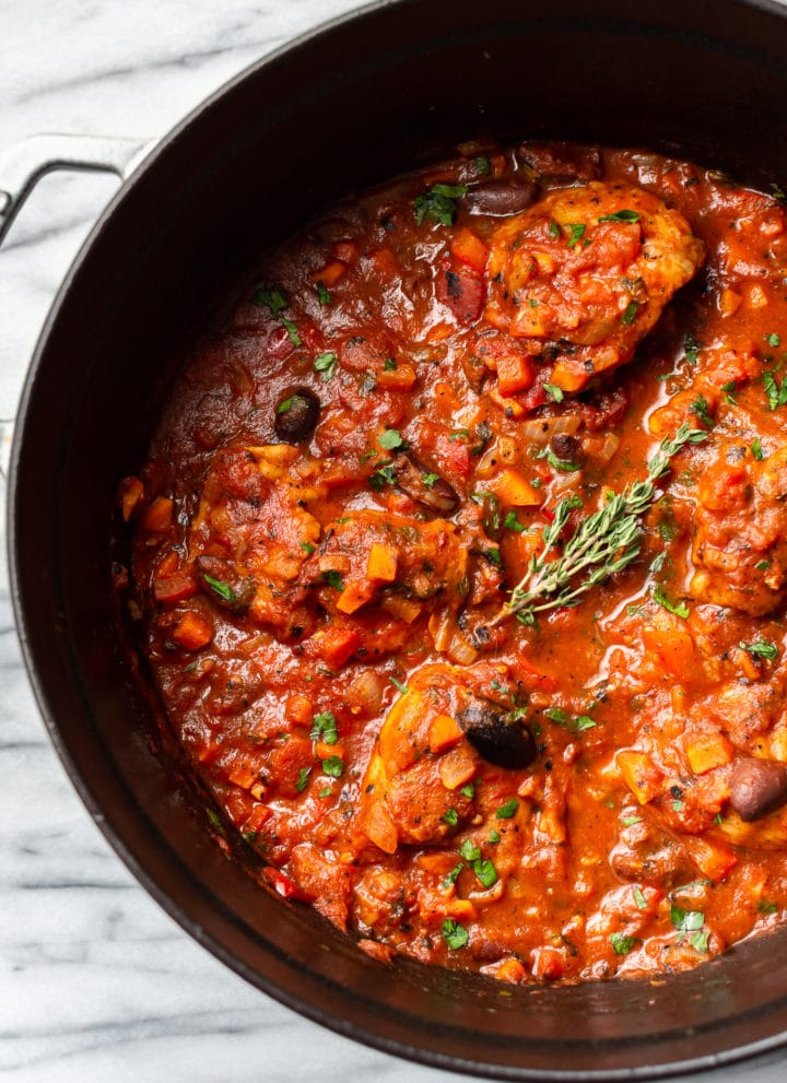 close-up of the best Chicken Cacciatore in a Dutch oven