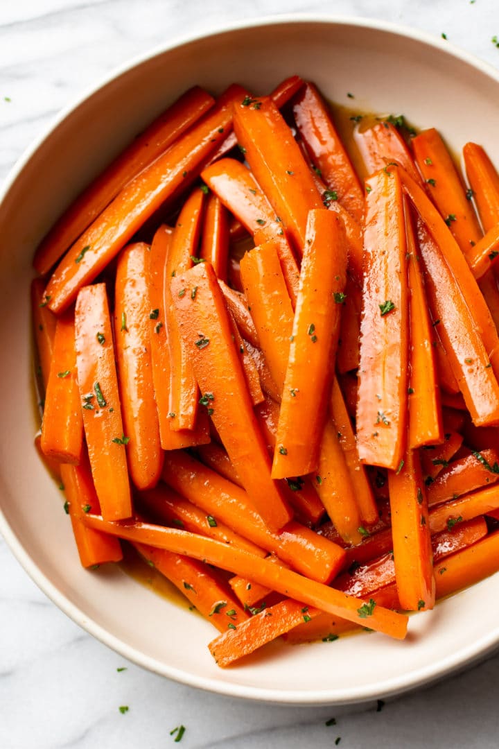 brown sugar glazed carrots in a serving bowl