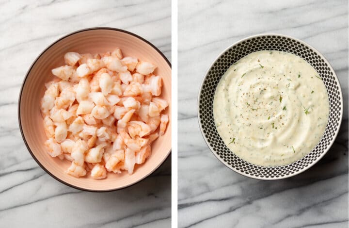 shrimp in a bowl next to a bowl of creamy dill dressing