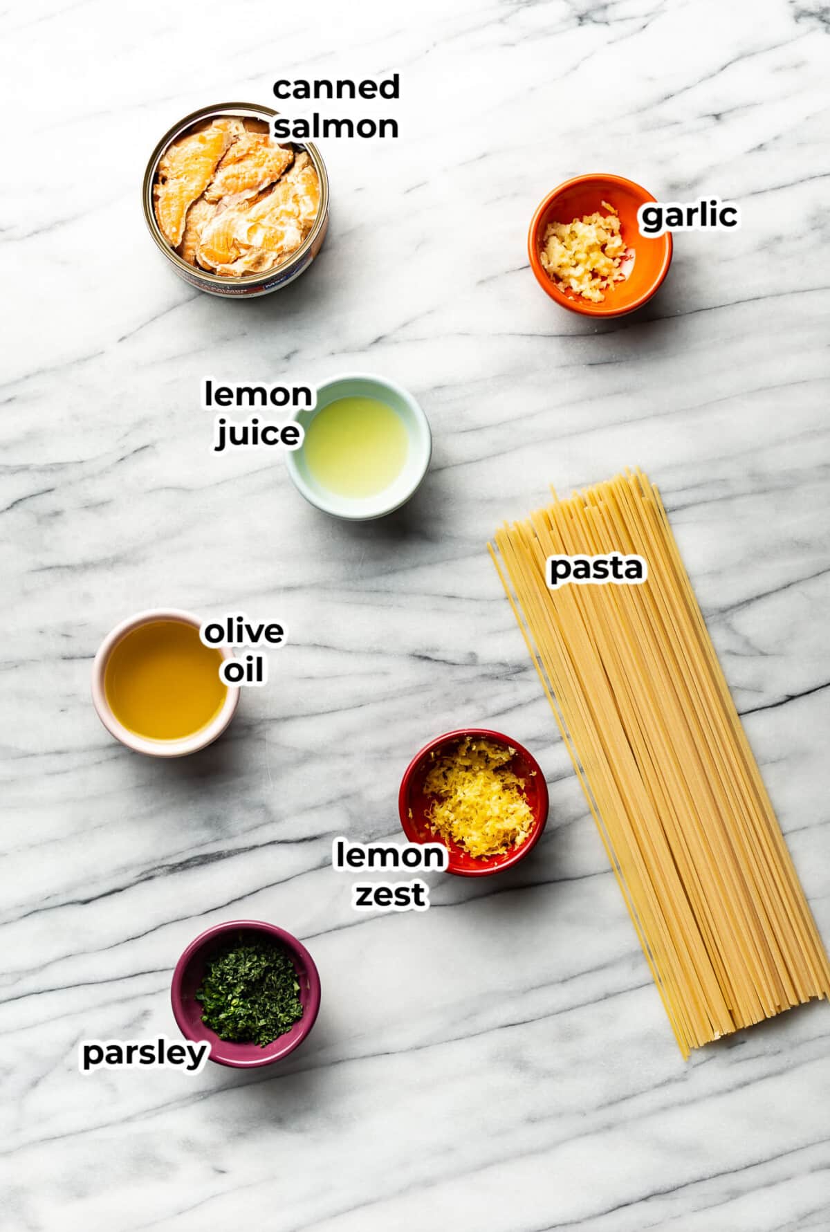 ingredients for canned salmon pasta in prep bowls