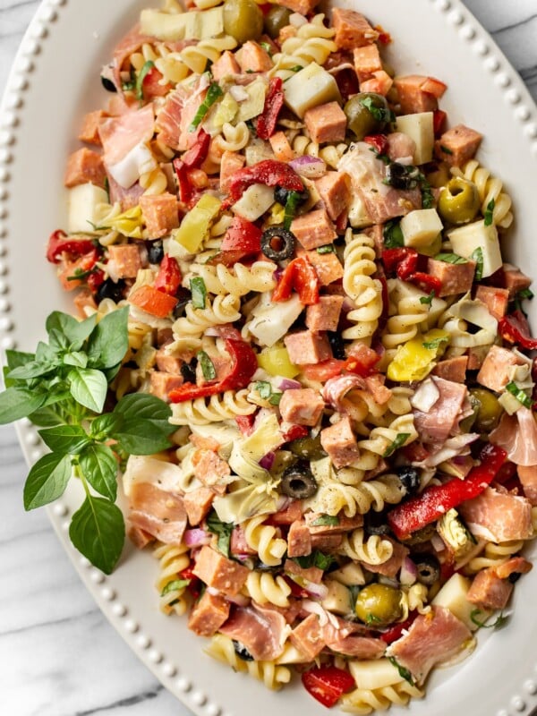 easy antipasto salad on a white platter