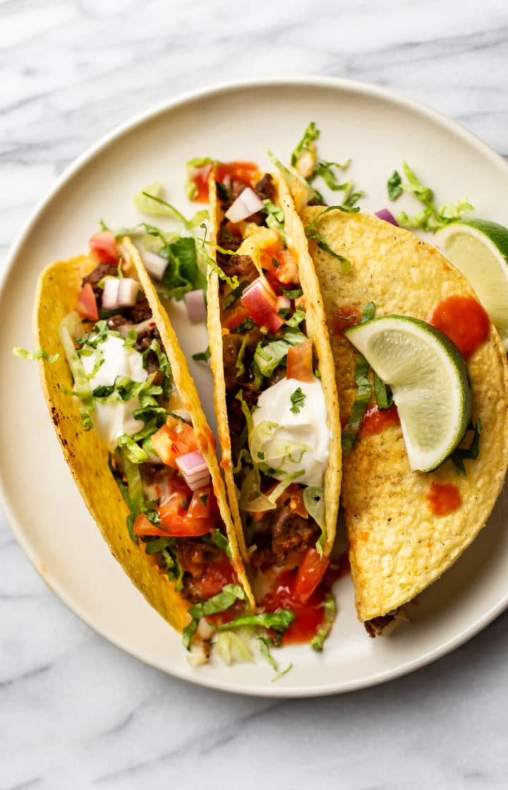 baked beef tacos on a plate