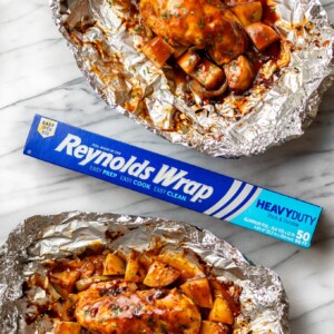 two BBQ Chicken Foil Packs pictured with Reynolds Wrap Foil