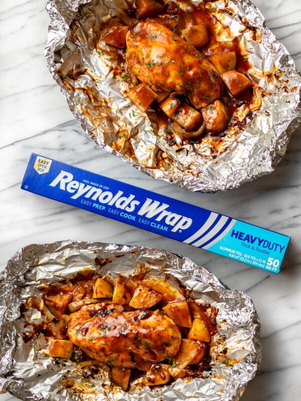 two BBQ Chicken Foil Packs pictured with Reynolds Wrap Foil