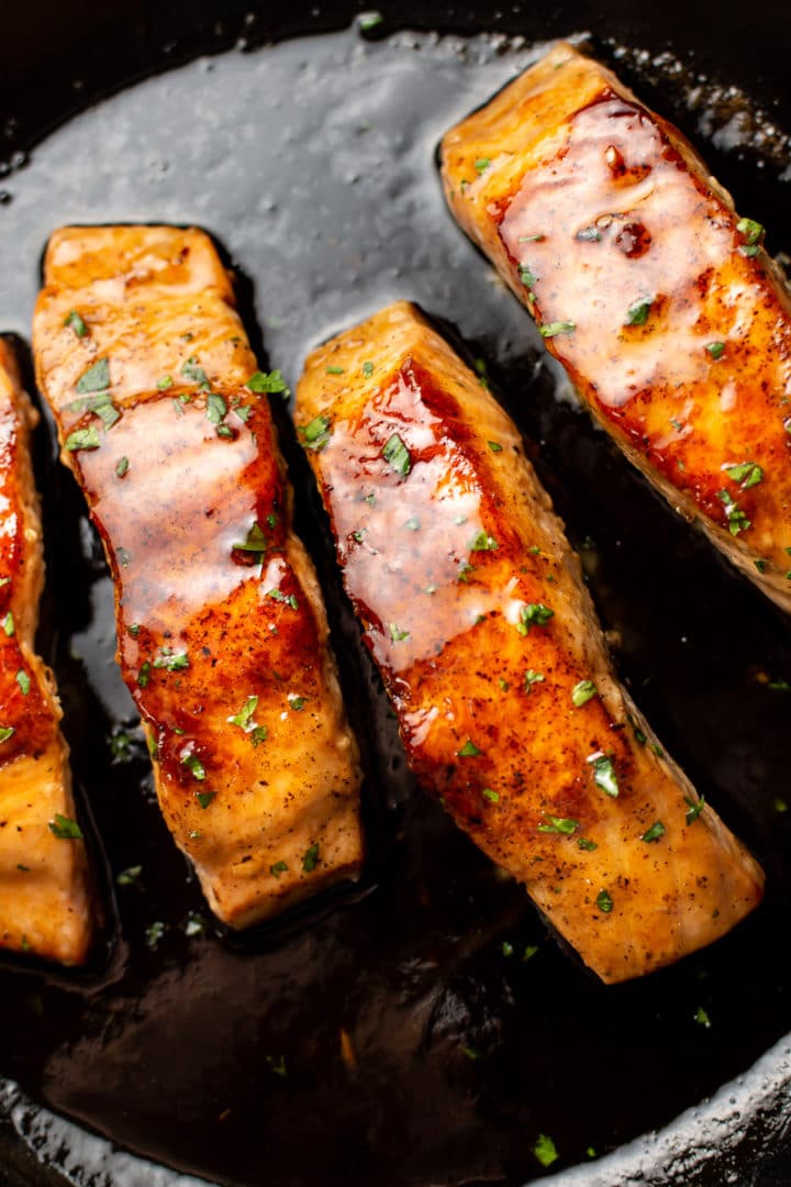 close-up of brown sugar salmon in a skillet