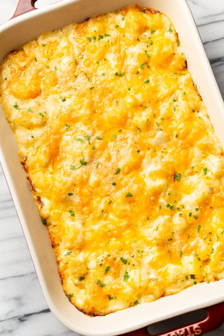 the best cheesy potato bake in a casserole dish