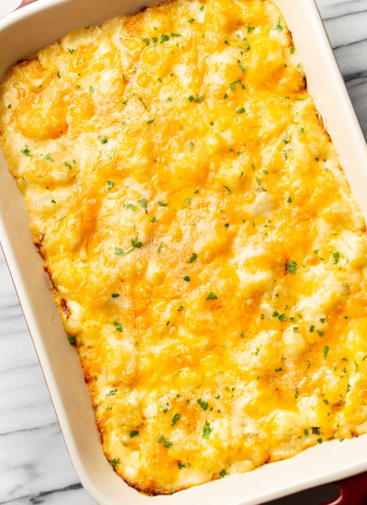 the best cheesy potato bake in a casserole dish