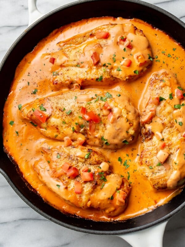 chicken in a tomato cream sauce in a skillet