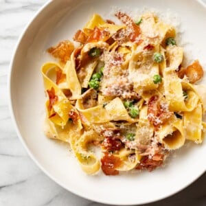 prosciutto pasta in a shallow bowl