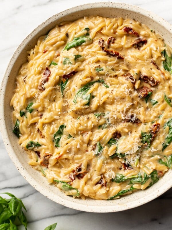 creamy Tuscan orzo in a serving bowl