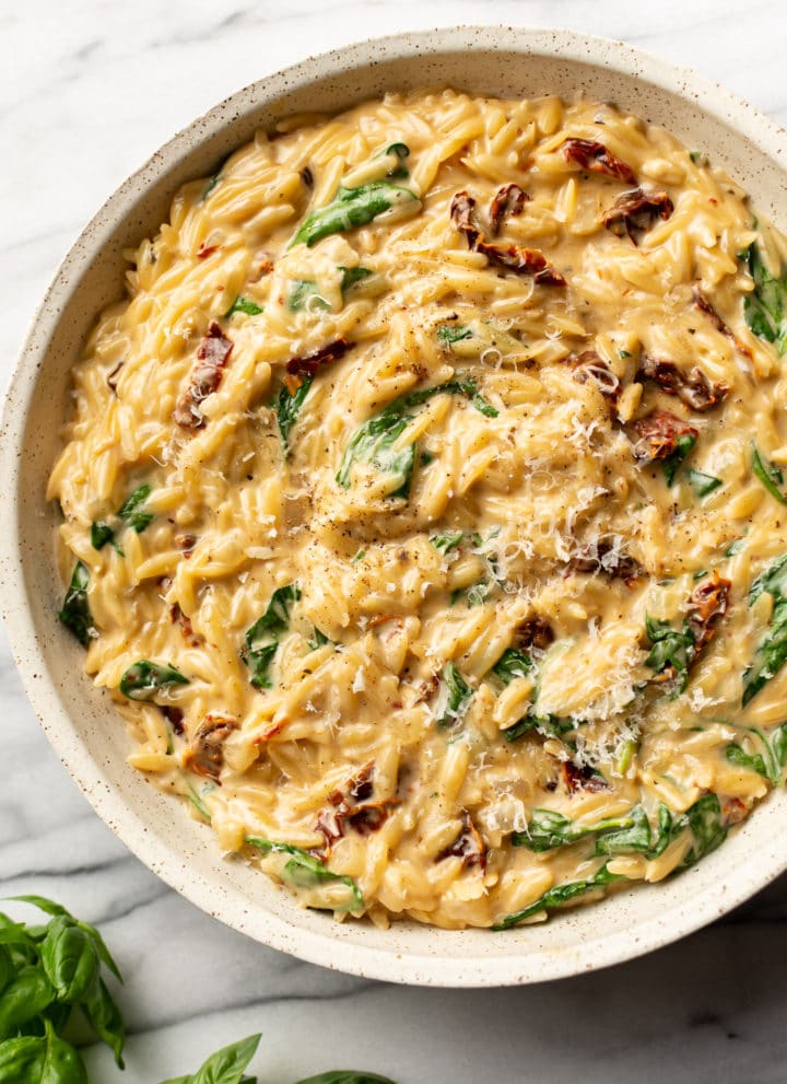creamy Tuscan orzo in a serving bowl