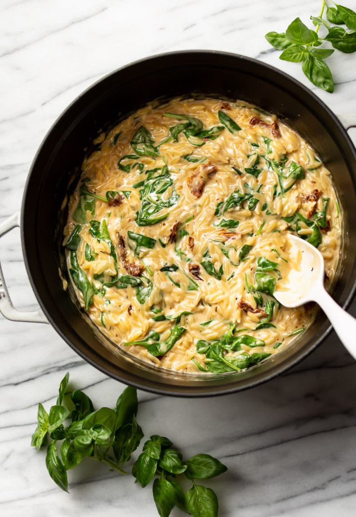 creamy Tuscan orzo in a pot