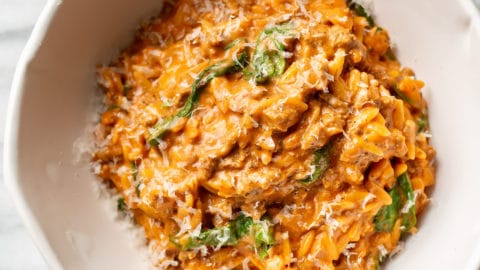 one pot ground beef and orzo in two white bowls