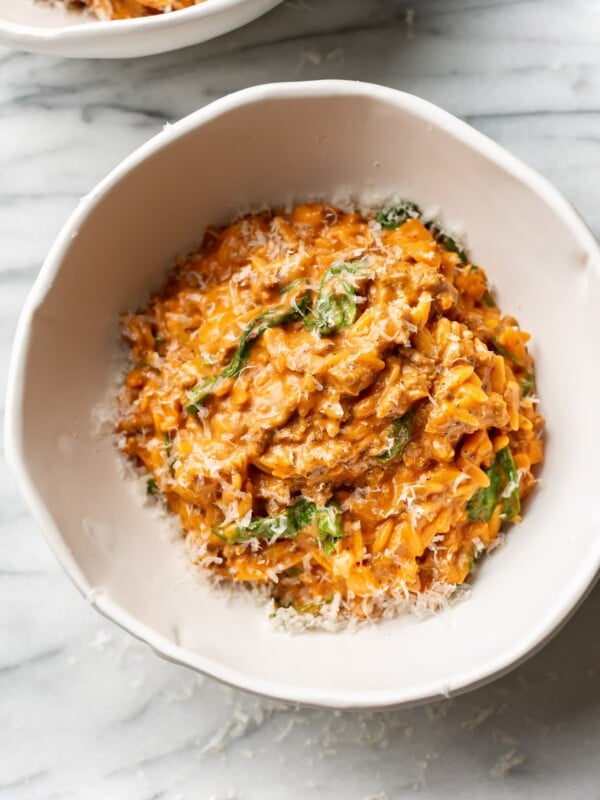 one pot ground beef and orzo in two white bowls