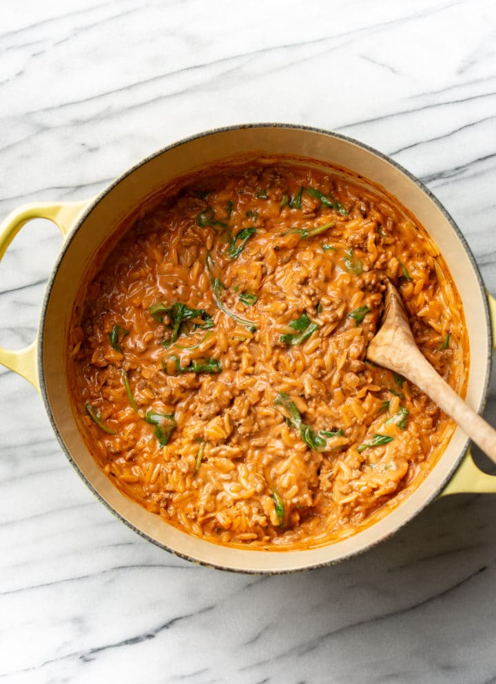 ground beef orzo in a yellow pot