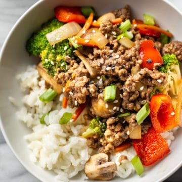 easy ground beef stir fry close-up in a white bowl