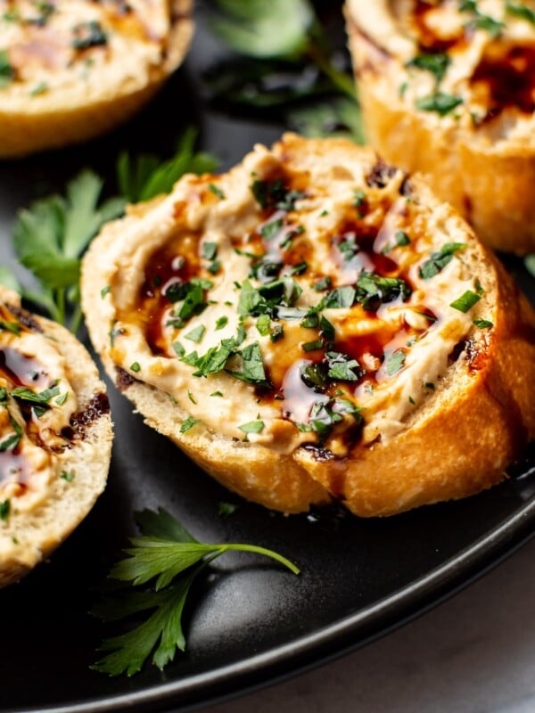 close-up of balsamic glazed hummus crostini