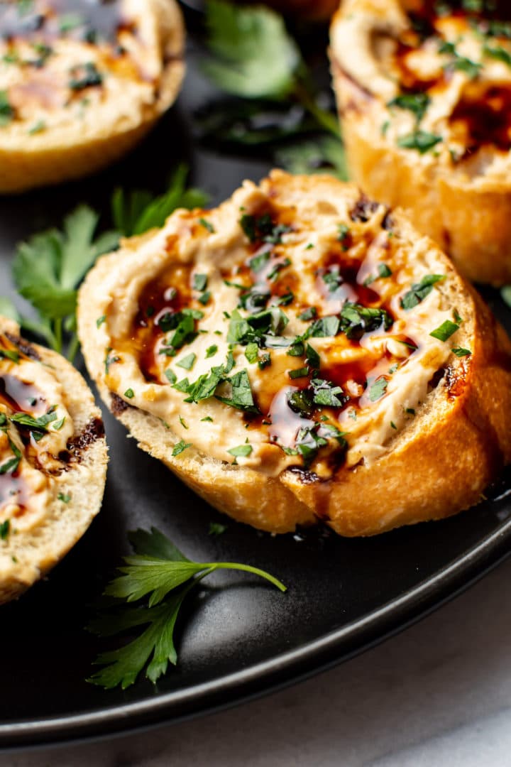 close-up of balsamic glazed hummus crostini