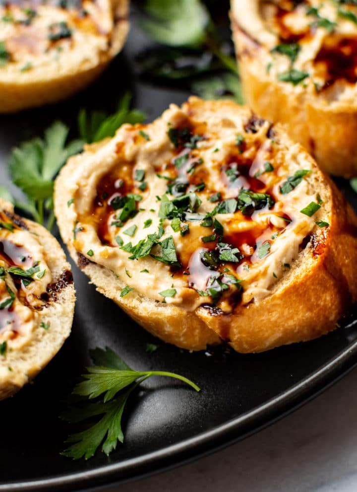 close-up of balsamic glazed hummus crostini