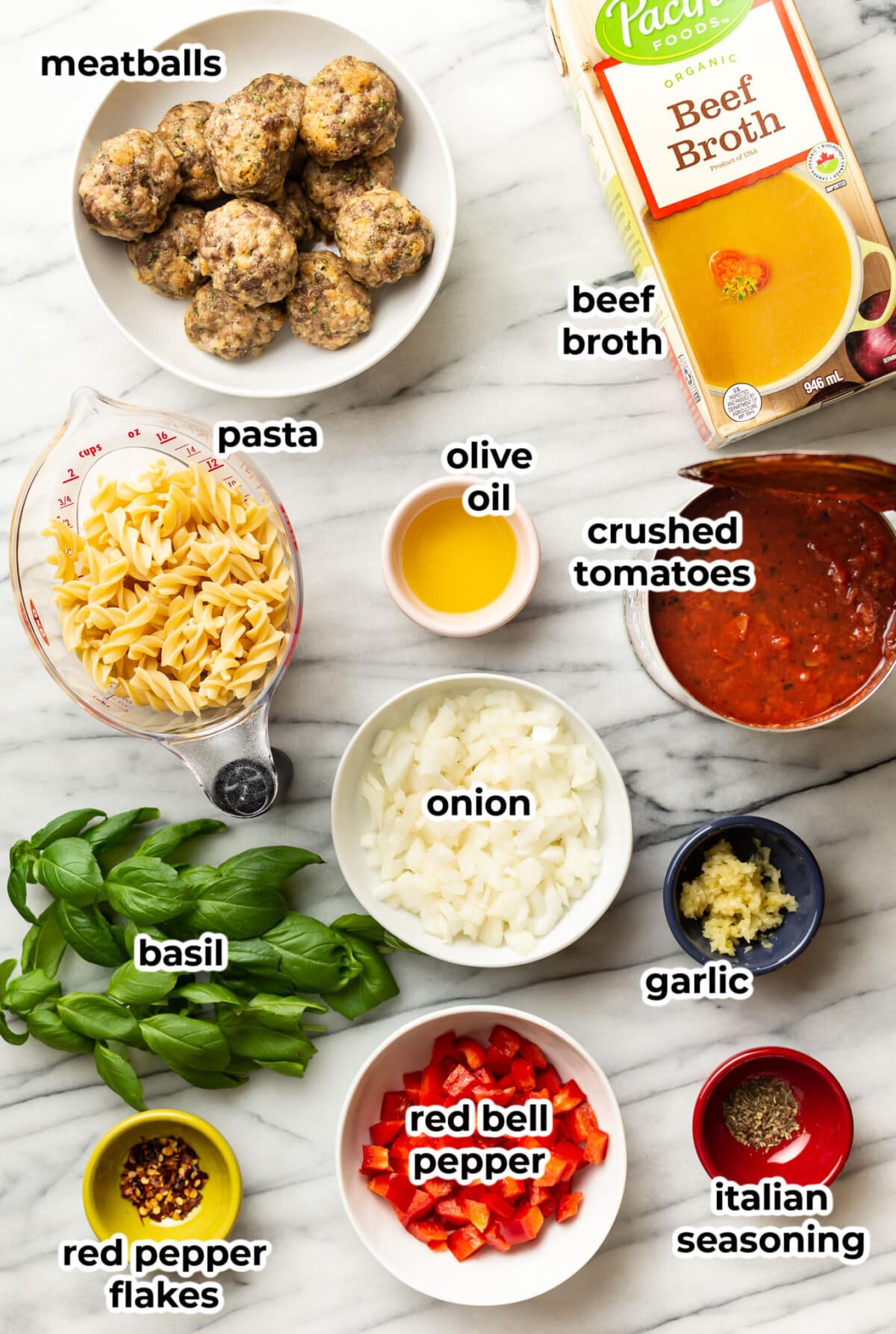 ingredients for meatball soup in prep bowls