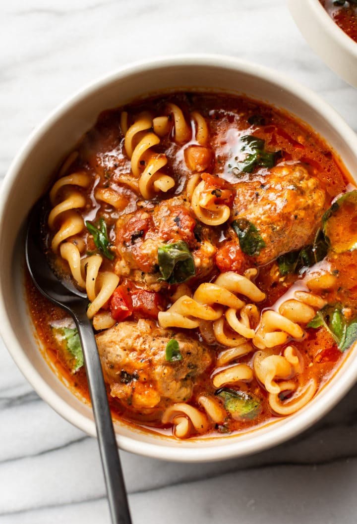 close-up of Italian meatball soup in a bowl