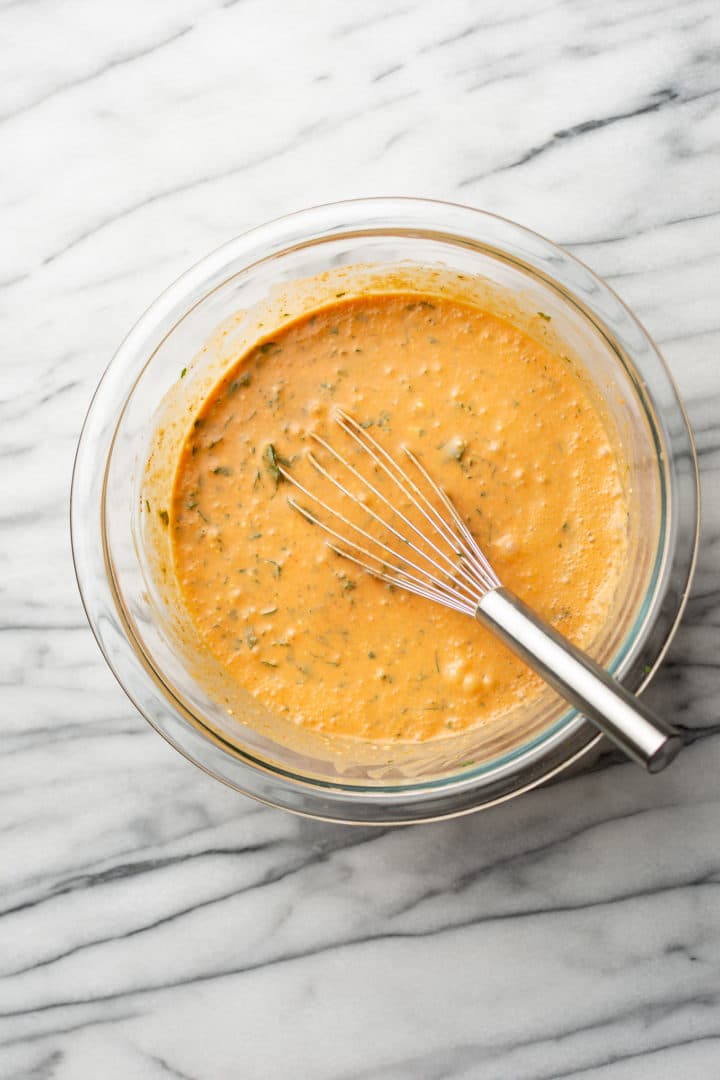 cilantro lime chicken marinade in a glass bowl