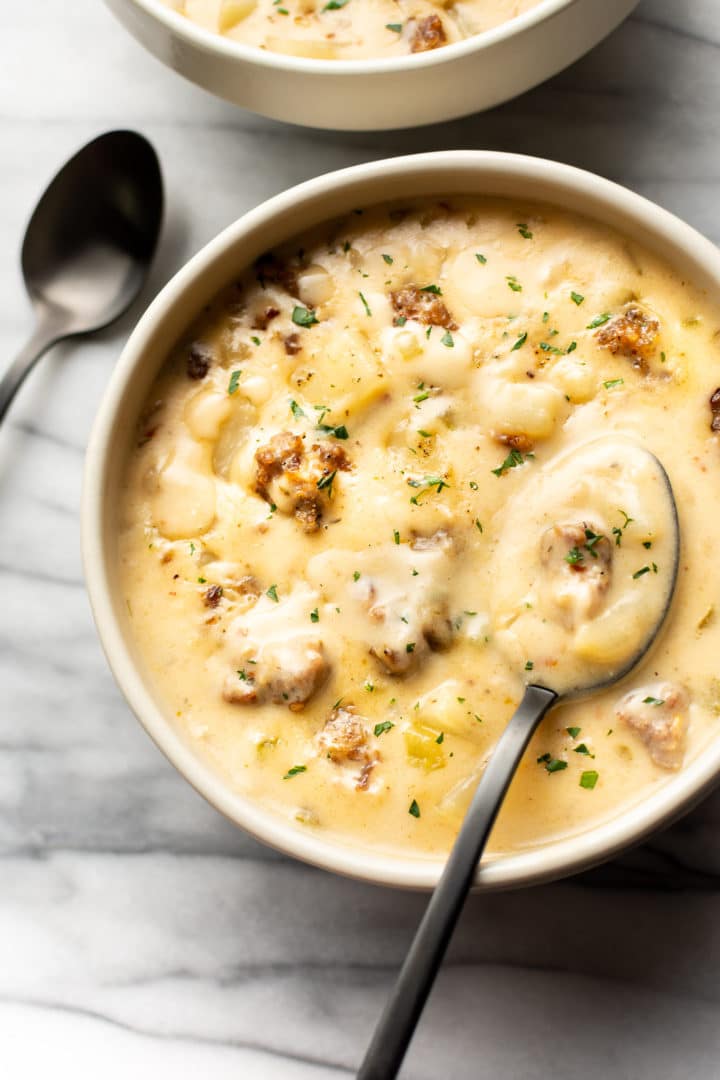 creamy Italian sausage soup close-up in a bowl