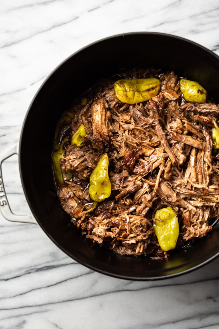 Mississippi pot roast close-up in a Dutch oven