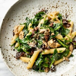 canned mackerel pasta close-up in a shallow bowl