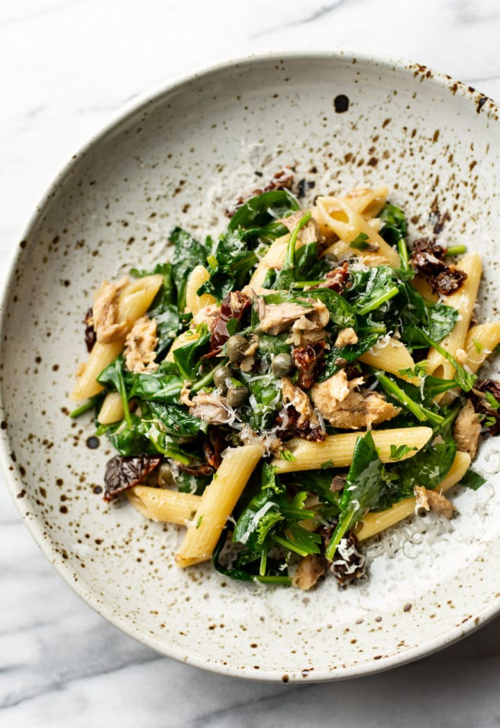 canned mackerel pasta close-up in a shallow bowl