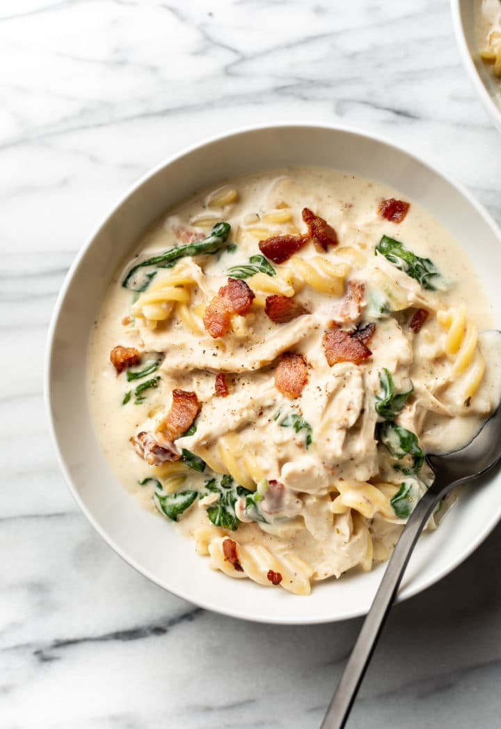 easy chicken bacon ranch soup in two white bowls