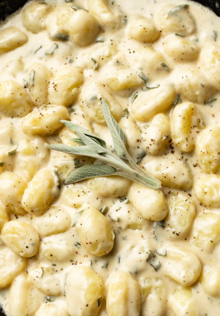 close-up of gnocchi with sage cream sauce