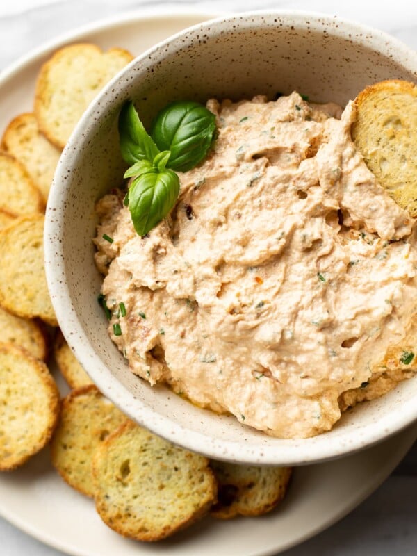 goat cheese dip surrounded by crostini