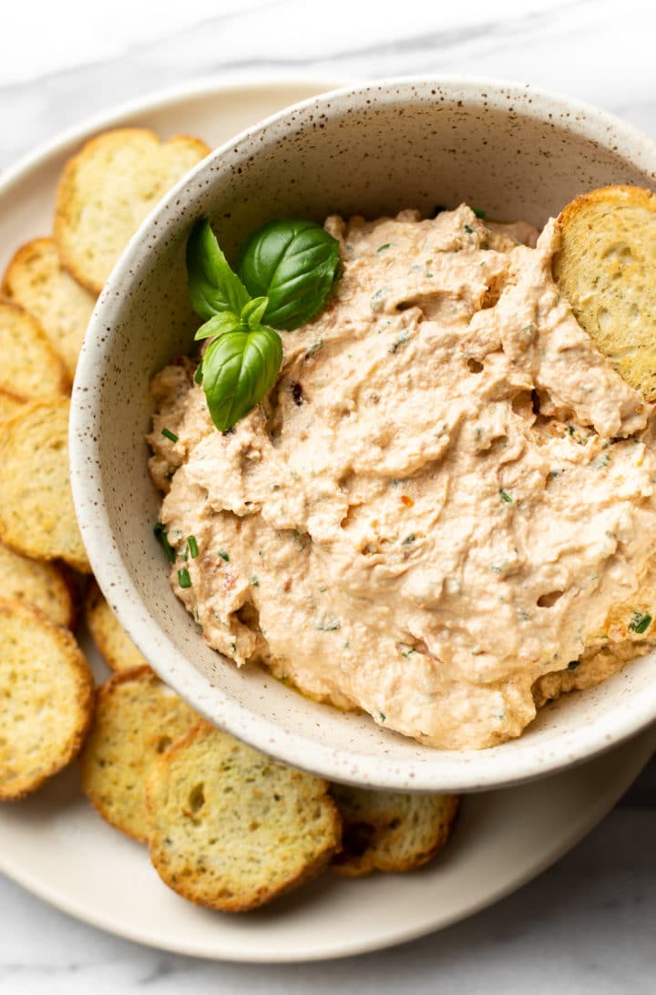 goat cheese dip surrounded by crostini