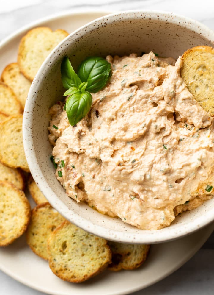 goat cheese dip surrounded by crostini