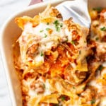 close-up of meatball casserole being lifted up by a spatula