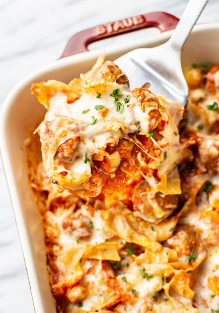 close-up of meatball casserole being lifted up by a spatula