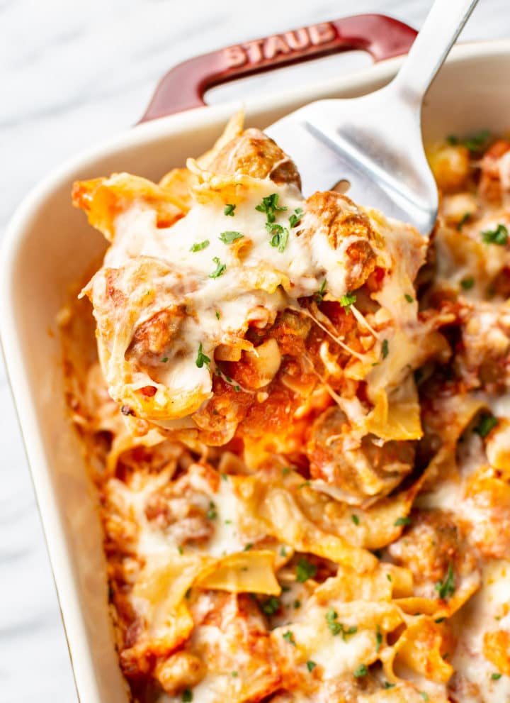 close-up of meatball casserole being lifted up by a spatula