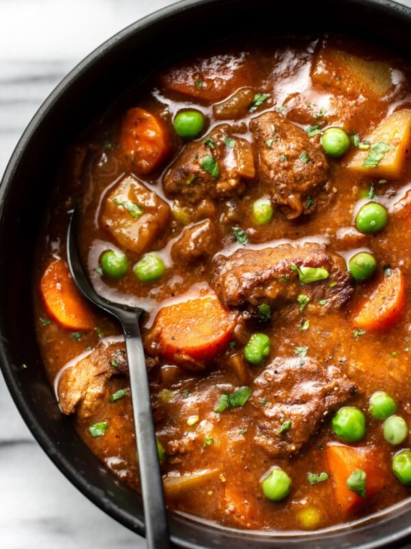 close-up of homemade beef stew in a bowl with a spoon