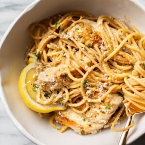 lemon pepper chicken pasta in a white bowl